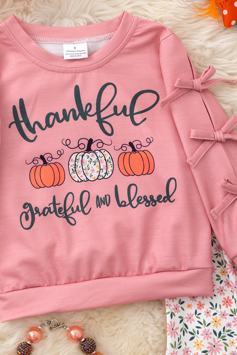Thankful grateful & blessed" bow sleeve top and floral bell bottoms. OFG51474