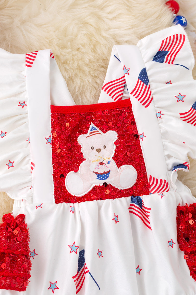 Patriotic teddy bear baby onesie with ruffle butt.