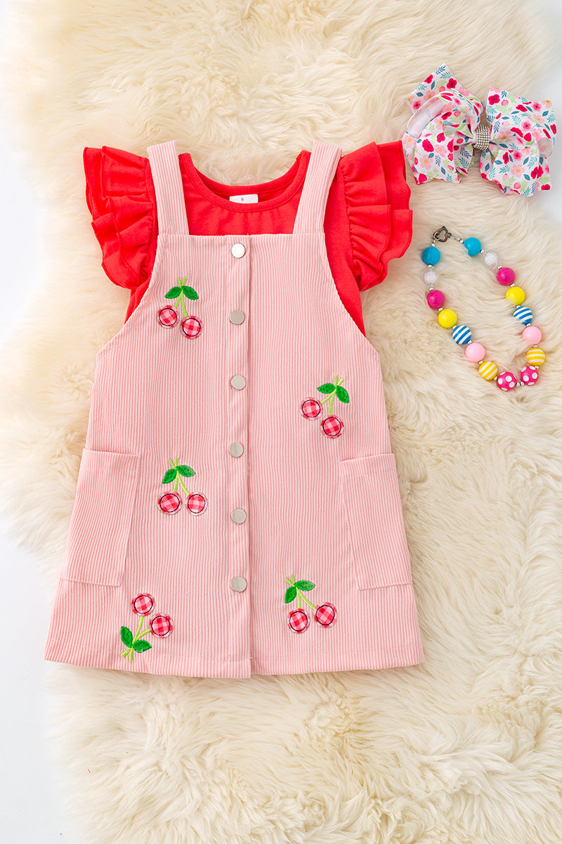 Plaid cherry applique on pink corduroy dress & red under shirt.