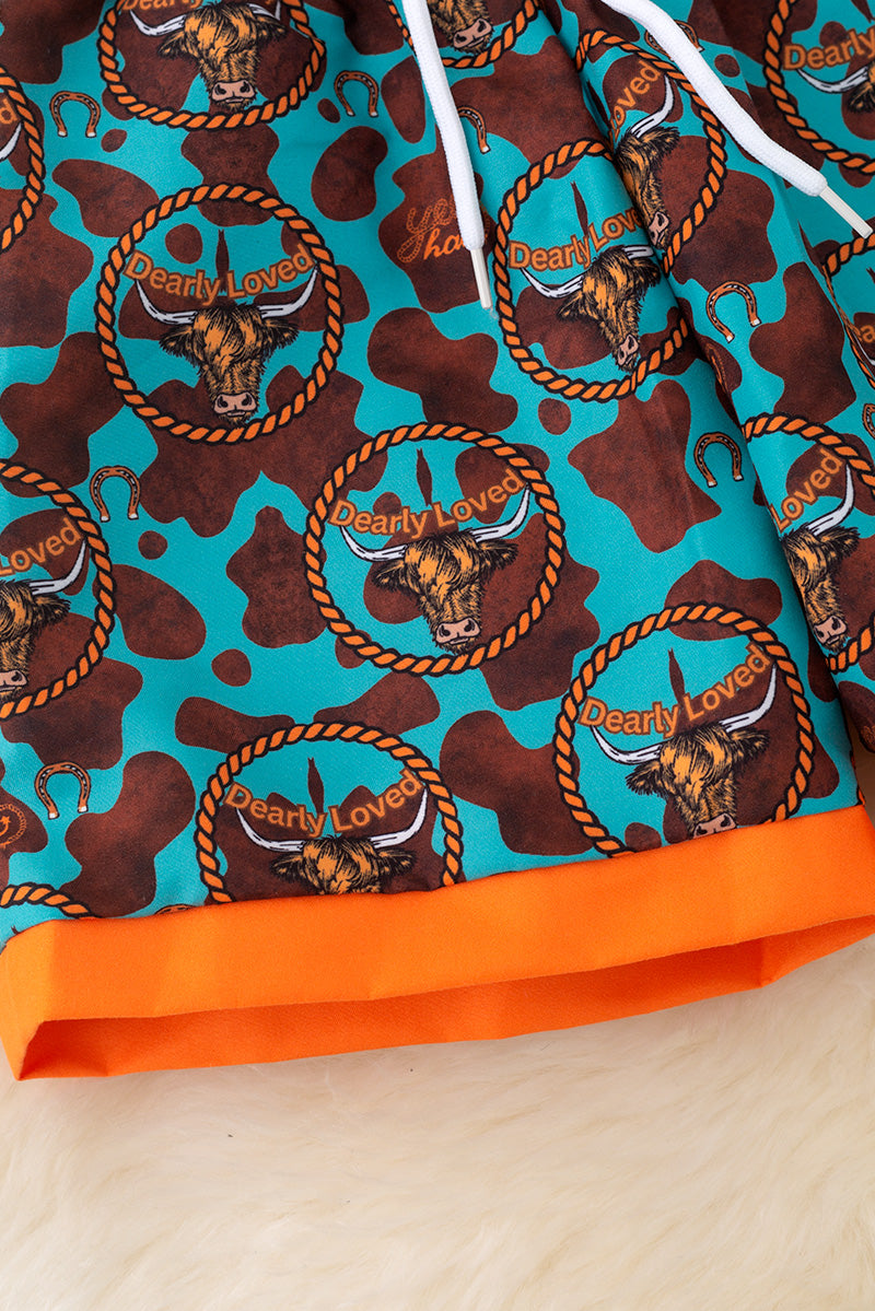 Teal with orange trim boys western trunks.