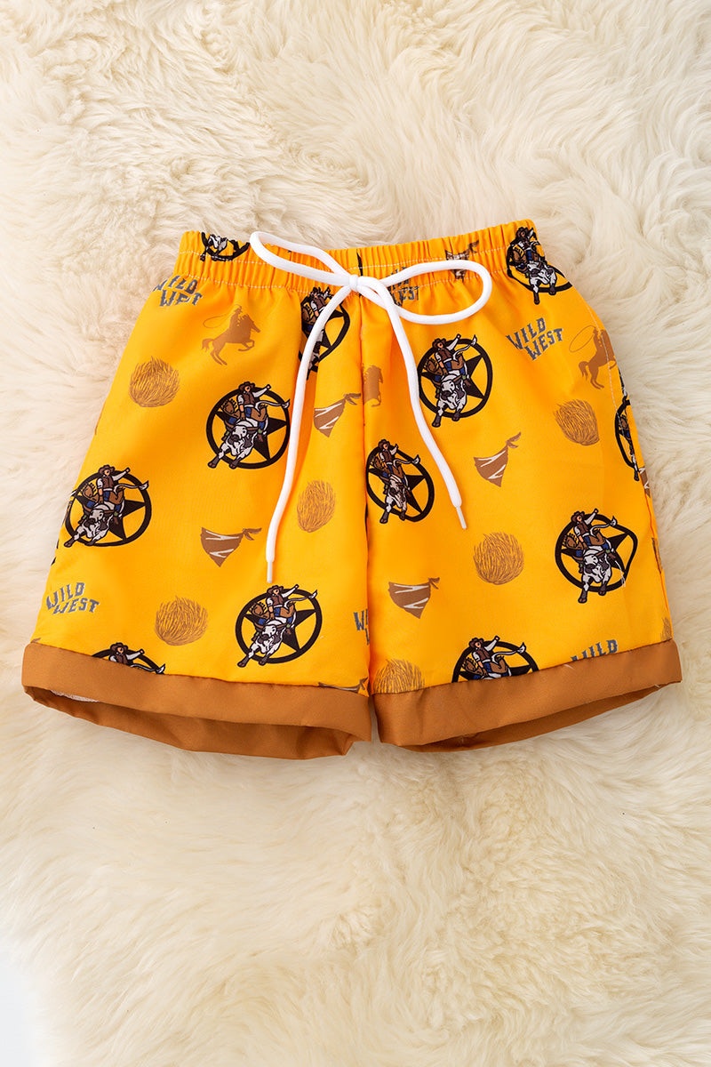 Wild west boys yellow trunks.