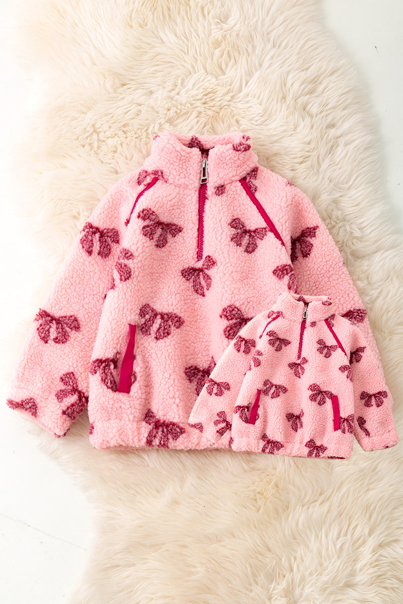 Women coquette sherpa bow printed pullover sweater.