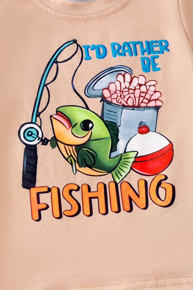 "I'd rather be fishing" Cream tee-shirt and blue fish printed shorts.