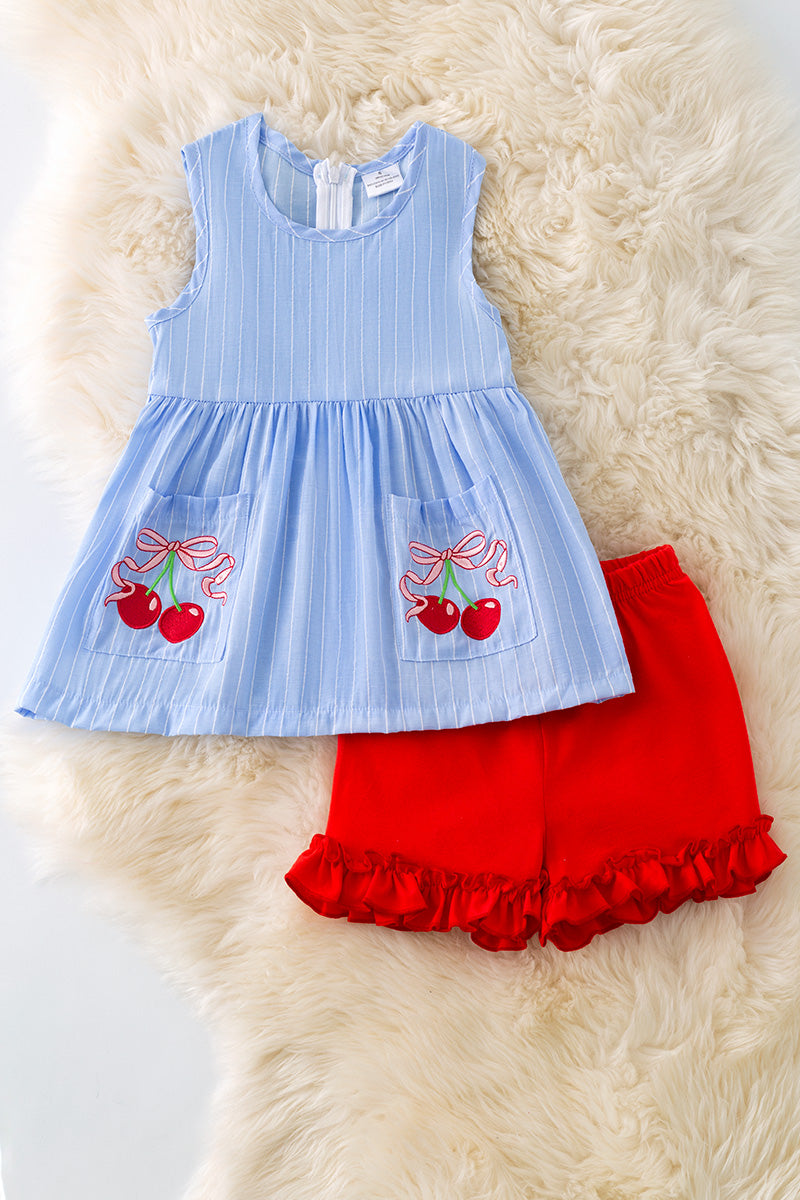 Cherry pocket tunic and red ruffle shorts. OFG50358
