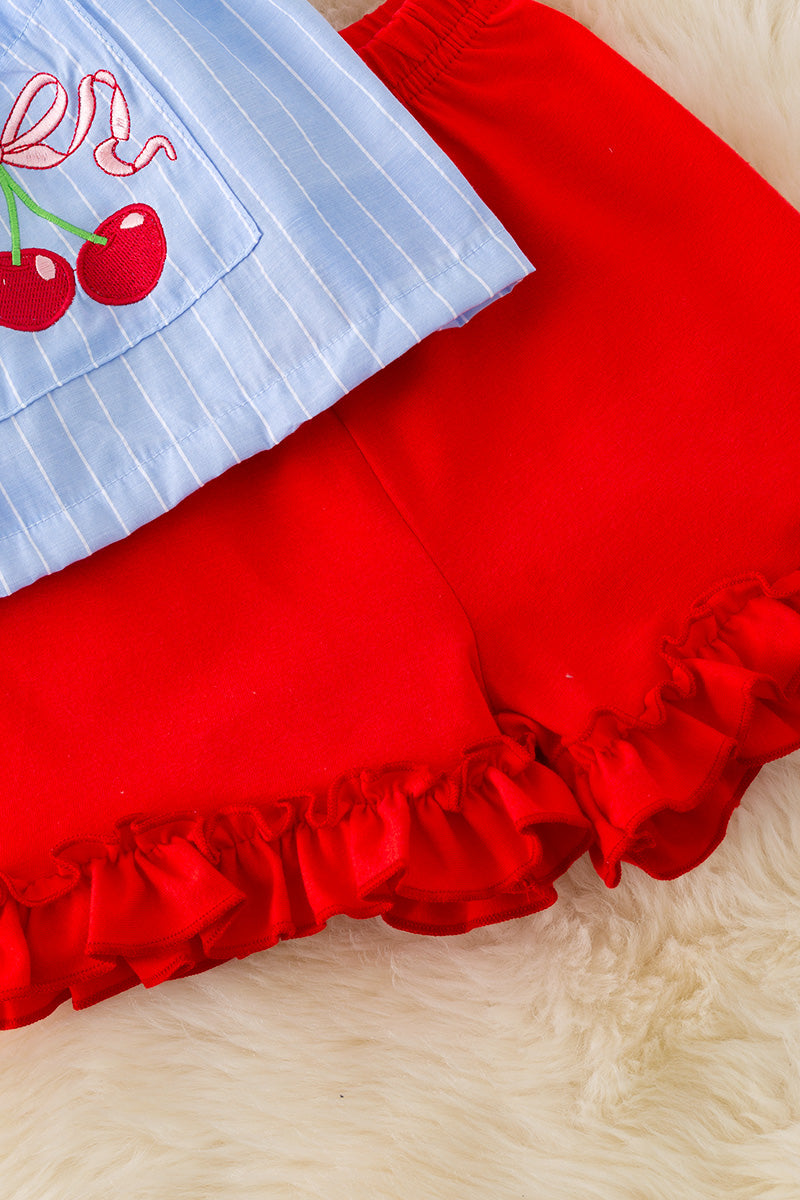 Cherry pocket tunic and red ruffle shorts. OFG50358