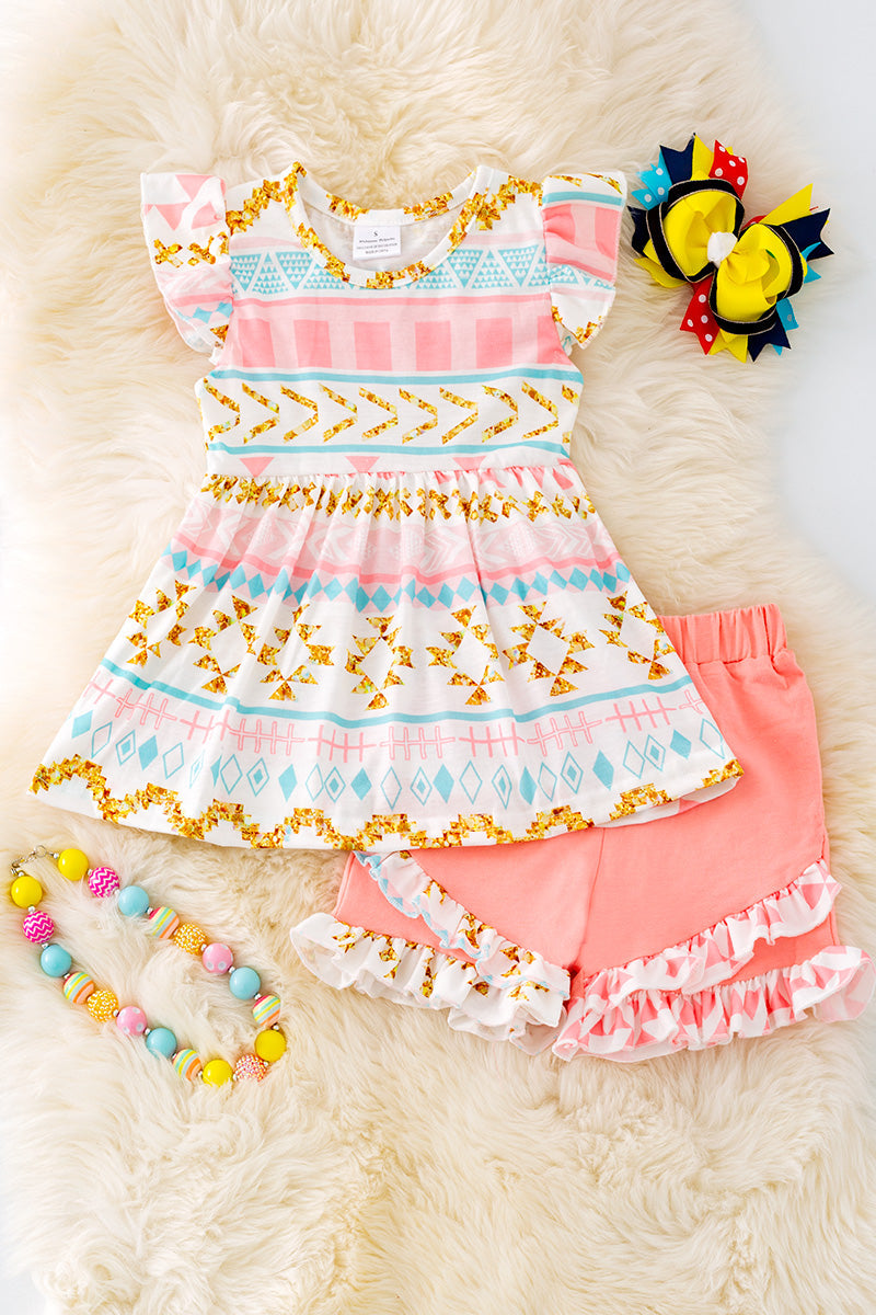 Geometric printed tunic & ruffle shorts.