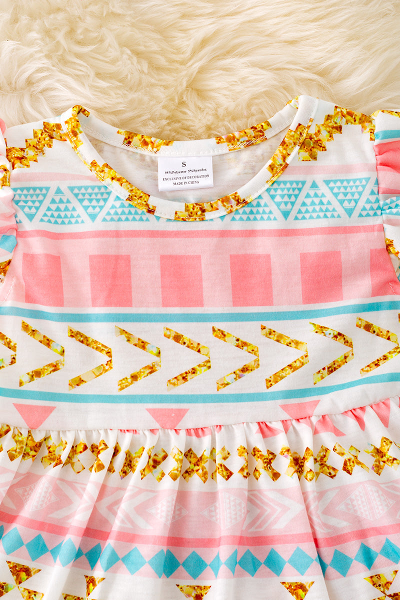 Geometric printed tunic & ruffle shorts.