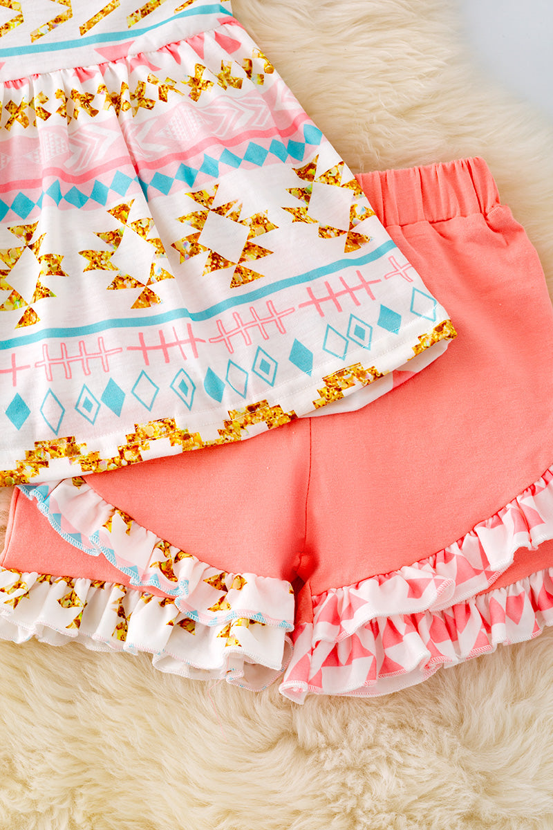 Geometric printed tunic & ruffle shorts.