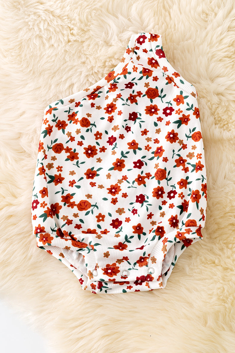 Cold shoulder ditsy floral bodysuit with snaps.