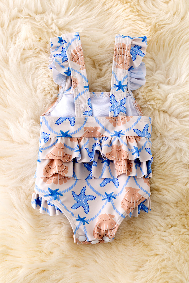 Seashells & sea star printed baby swimsuit. SWG50172