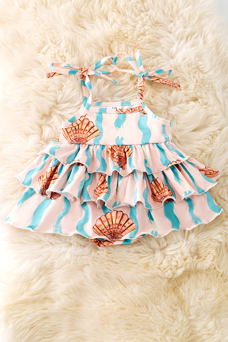 Seashell printed girls baby onesie with ruffle layer. RPG50642