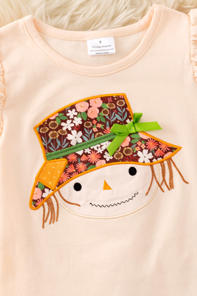 Scarecrow applique top and brown floral bell bottoms. OFG61420