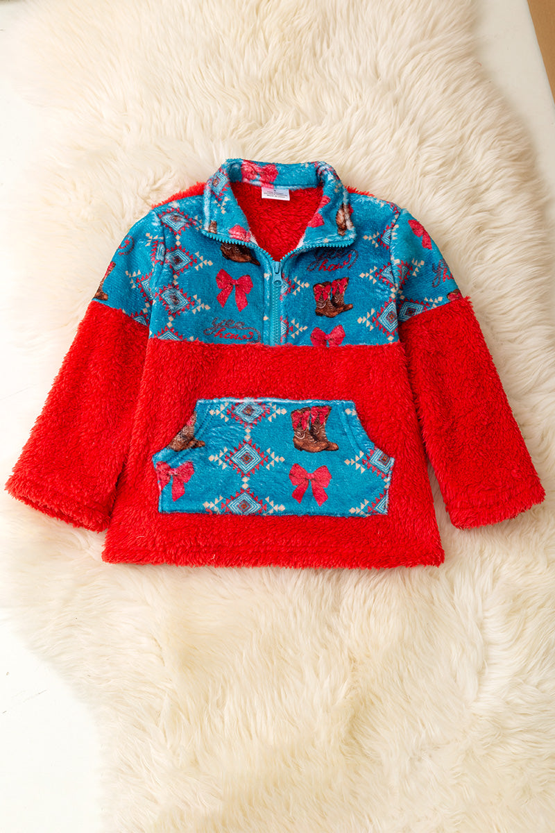 Sherpa Western printed on red pullover sweater.