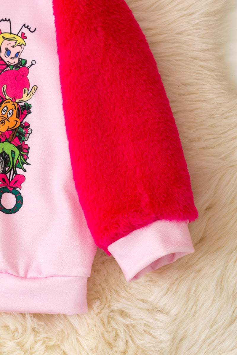 Merry Grinchmas" thunder printed pink sweatshirt with fuchsia faux fur sleeves.