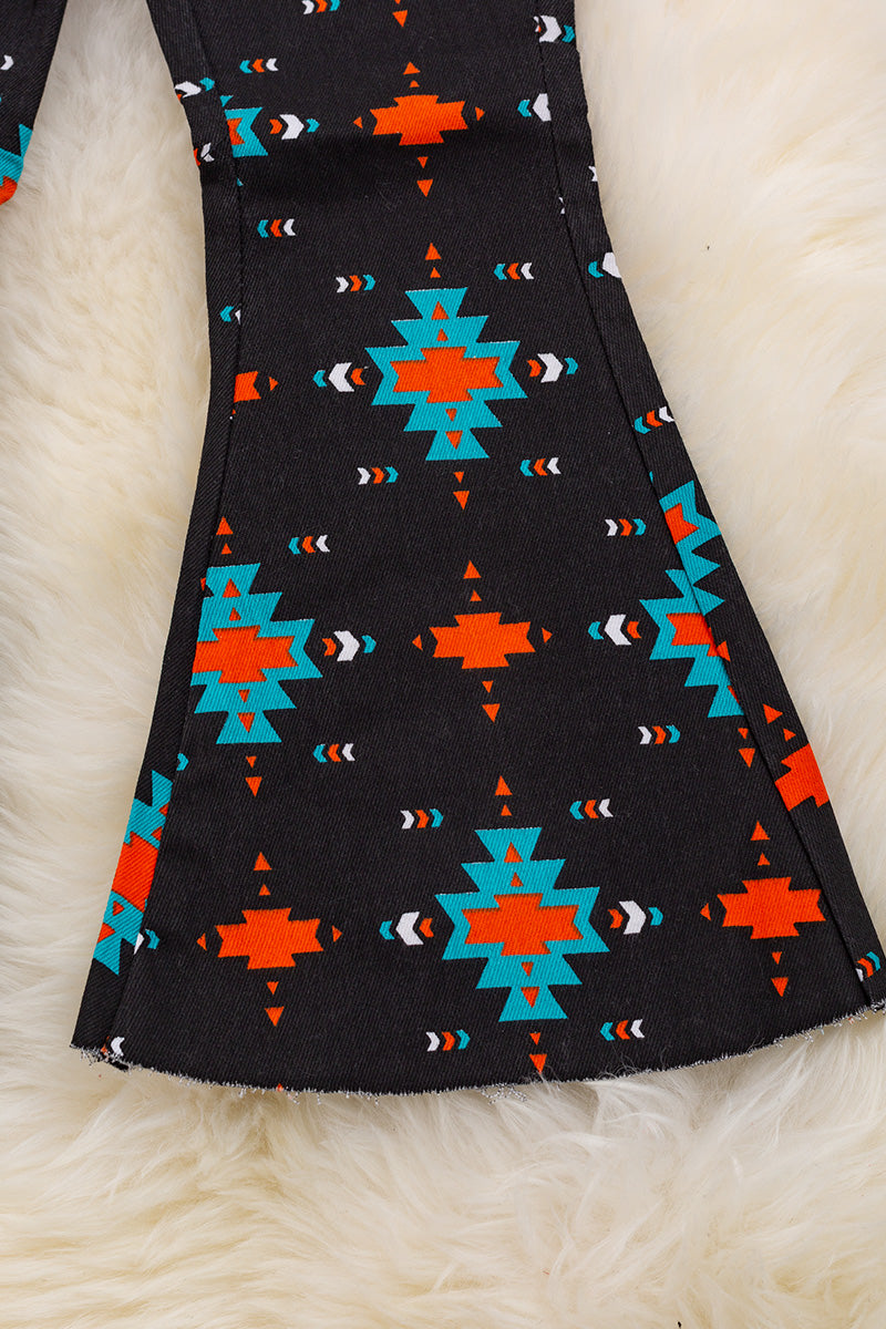 Black Aztec printed boot cut denim pants.