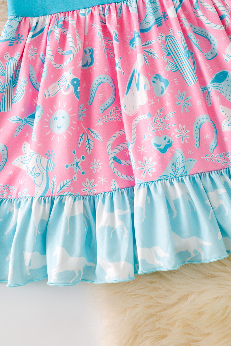 Turquoise and blue western printed girls dress with side bows.
