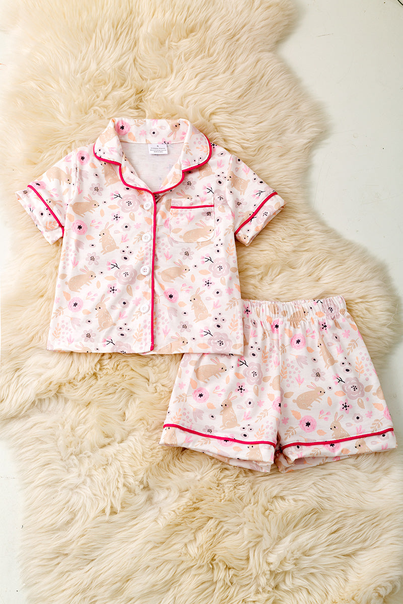 Girls Easter bunny pajamas with fuchsia trim.