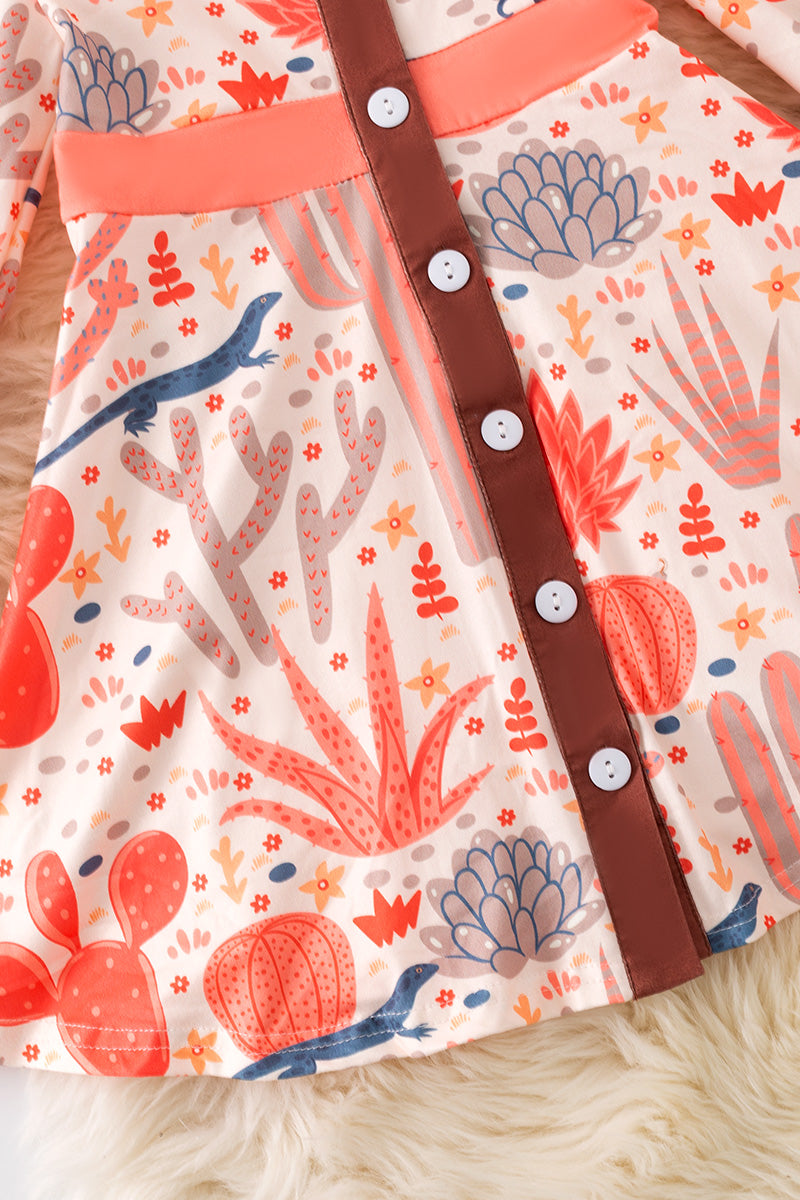 Orange western pattern printed girls dress. DRG52884