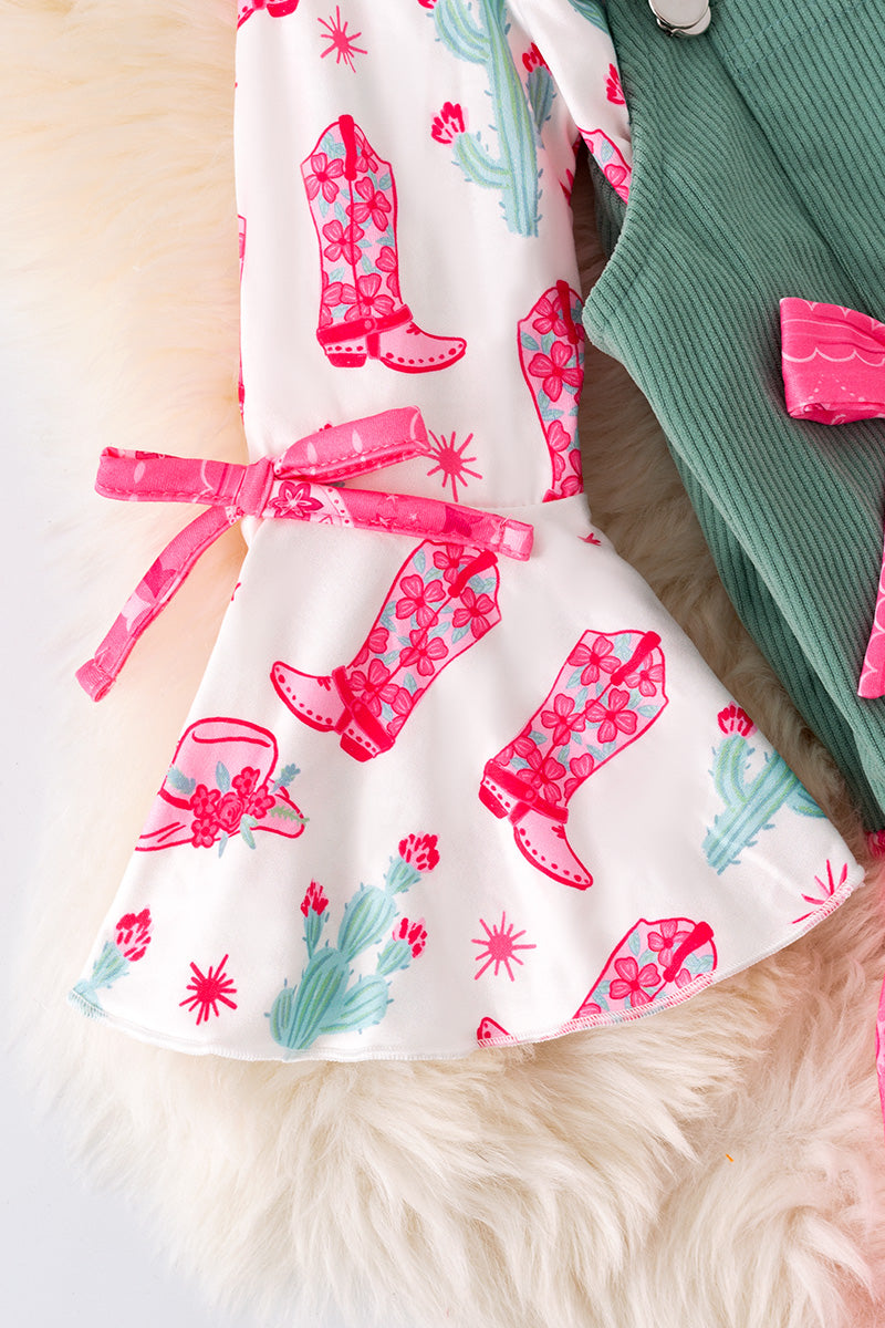 Ever Green corduroy suspender dress with Paisley hem and long sleeve shirt. (Western)