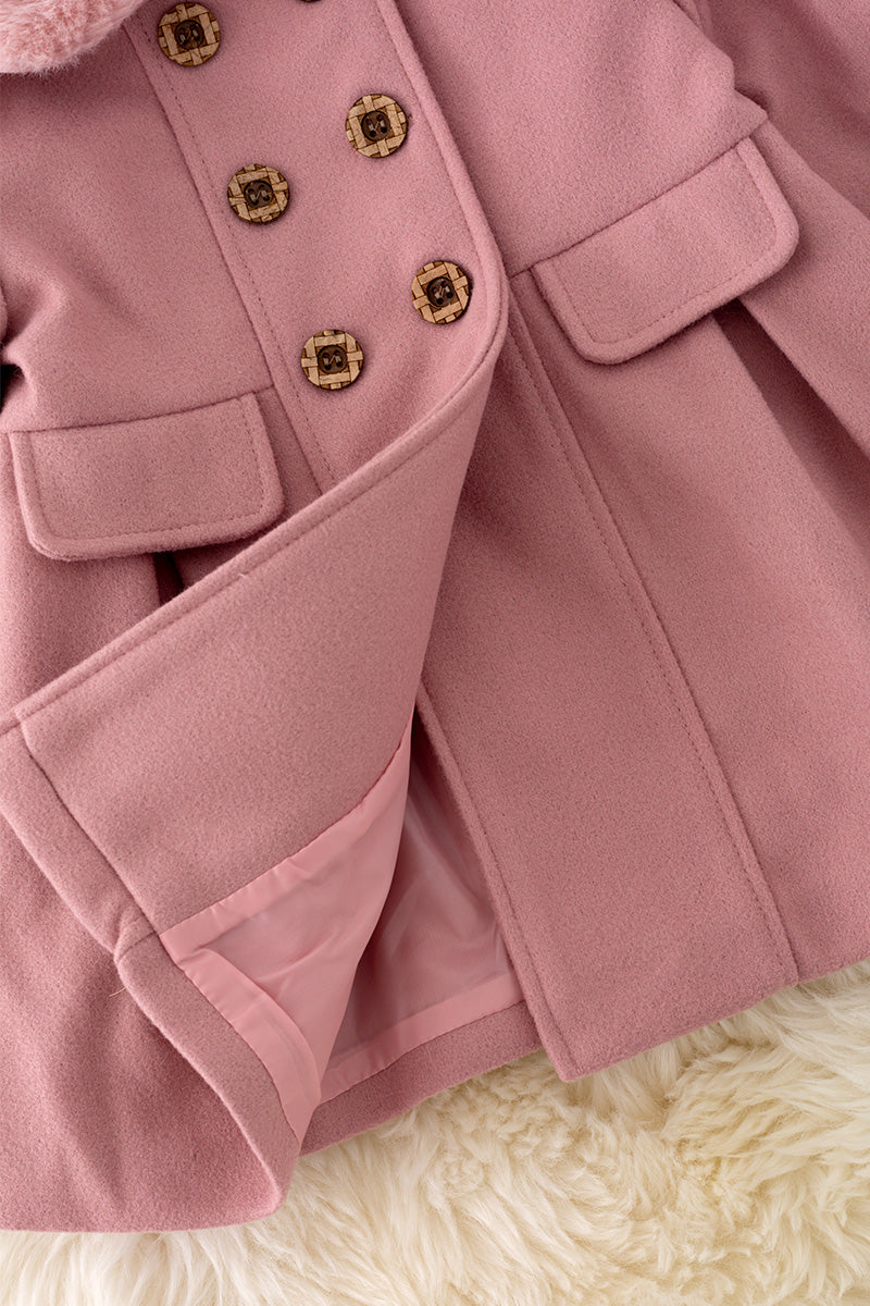 Pleated blush jacket with fur collar.