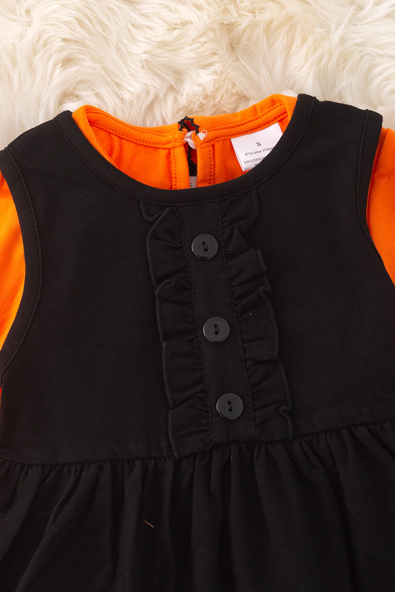 Black ghost applique dress with orange undershirt. OFG51174