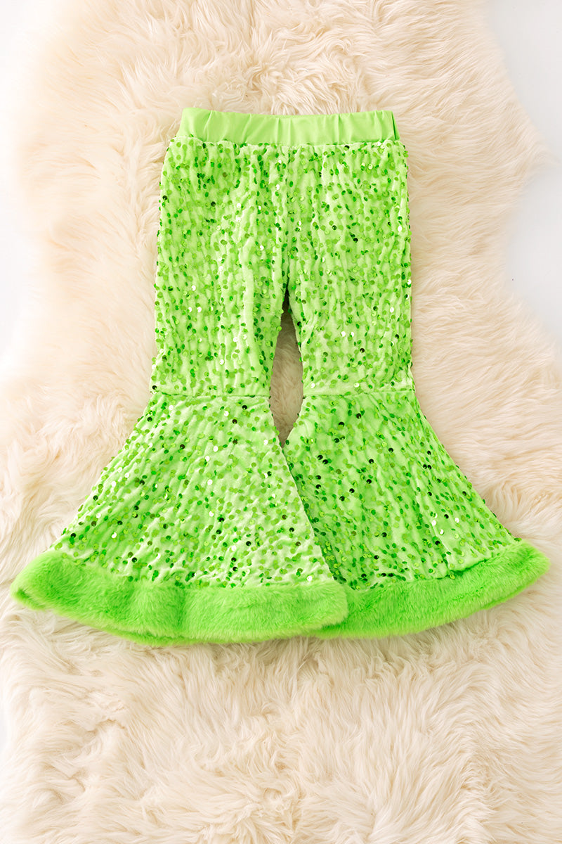 Neon green sequins bell bottoms with faux fur hem.