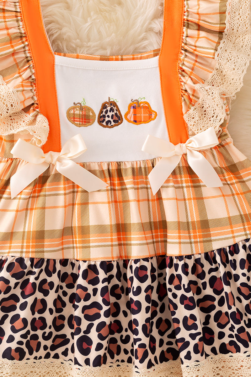 Orange plaid & animal printed tunic and matching leggings.