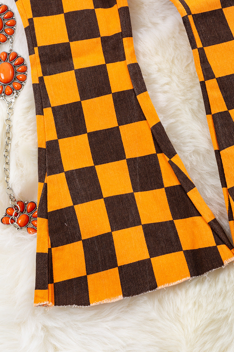 Orange & black checkered denim pants.