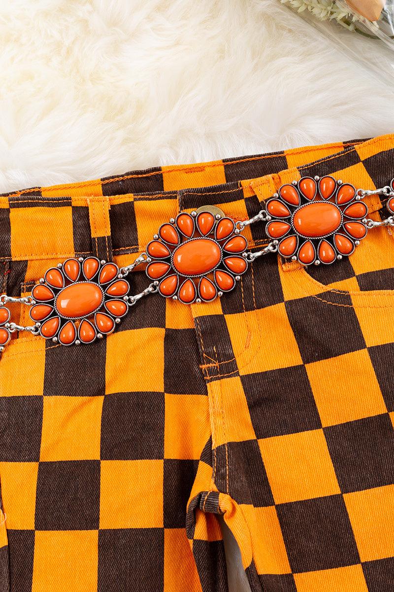 Orange & black checkered denim pants.