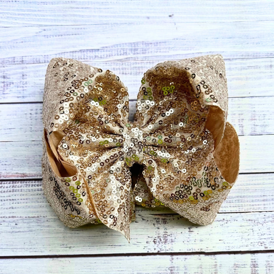 Double layer sequins bows w/alligator clip.