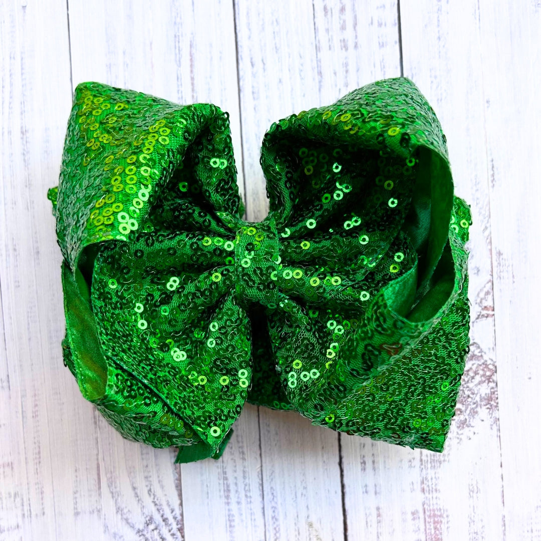 Double layer sequins bows w/alligator clip.