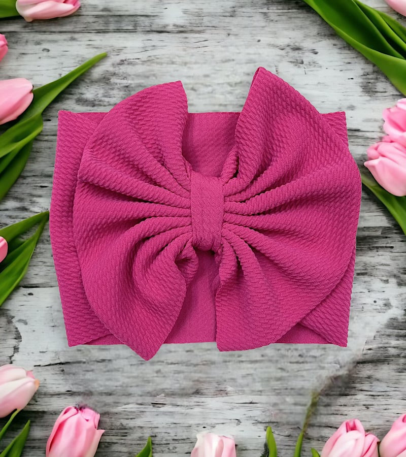 Wide band bow headband for baby.