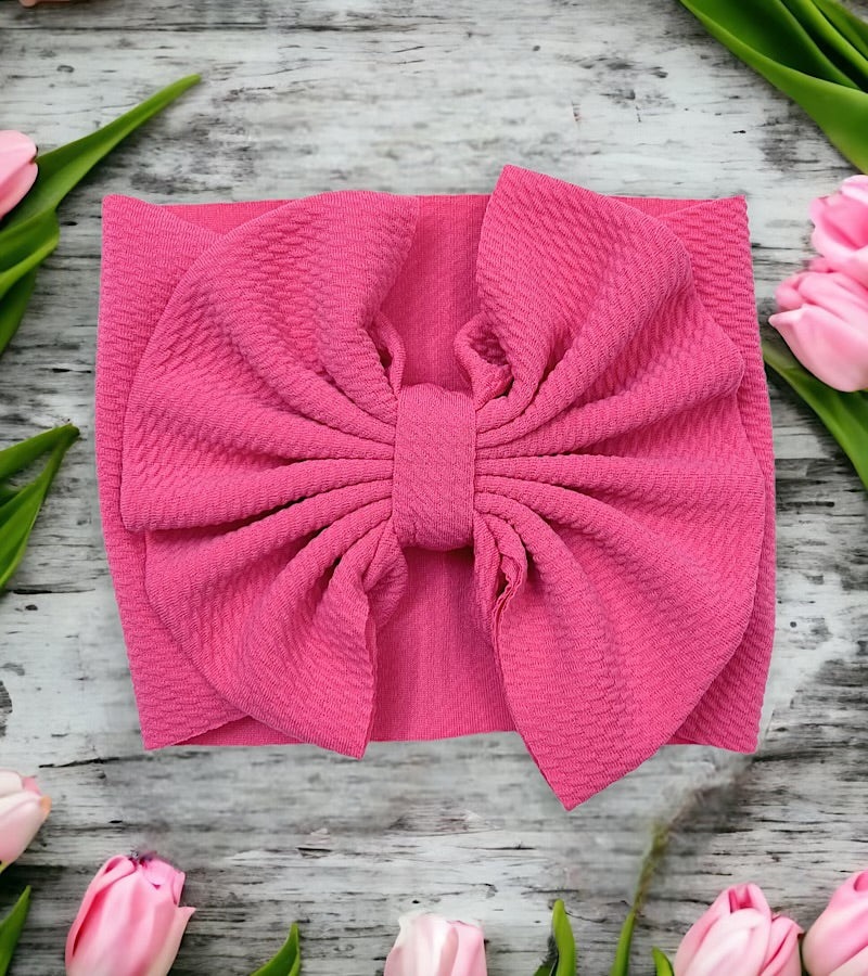 Wide band bow headband for baby.