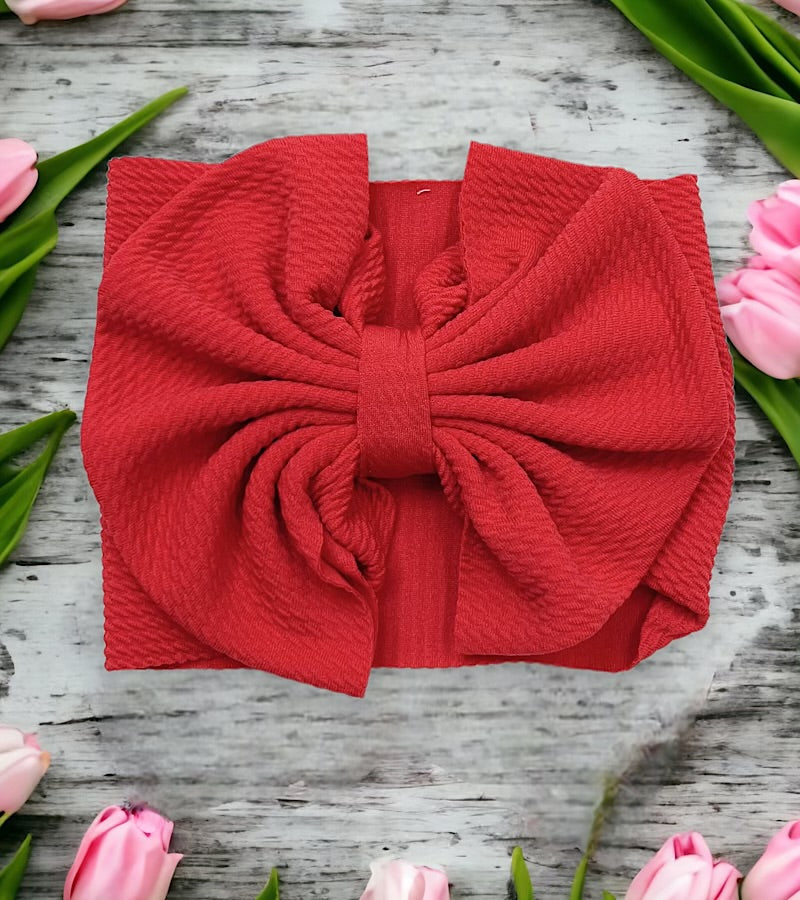 Wide band bow headband for baby.