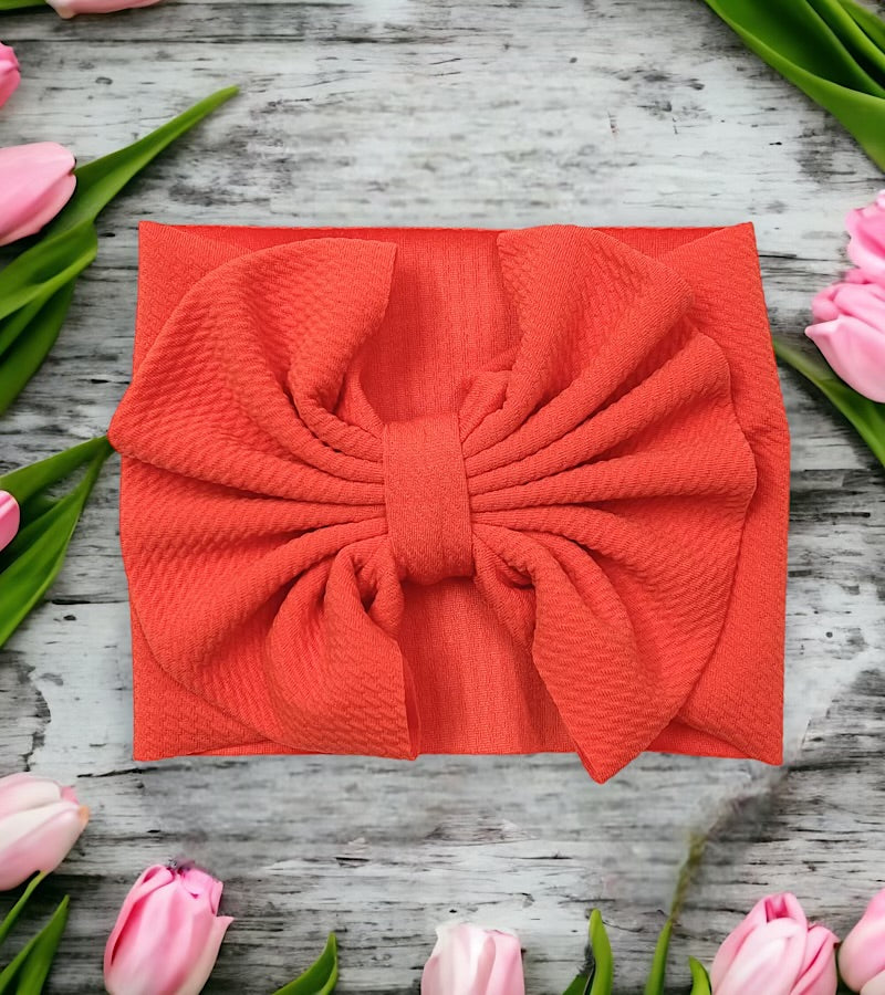 Wide band bow headband for baby.