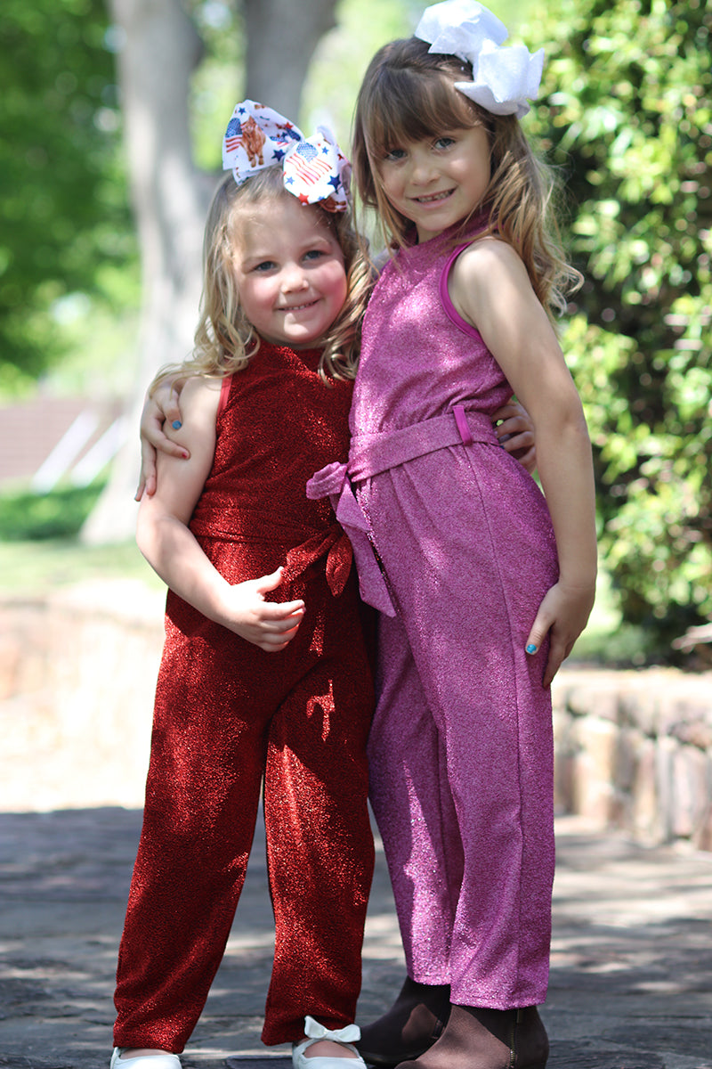 Shimmery jumpsuit perfect for occasion. -