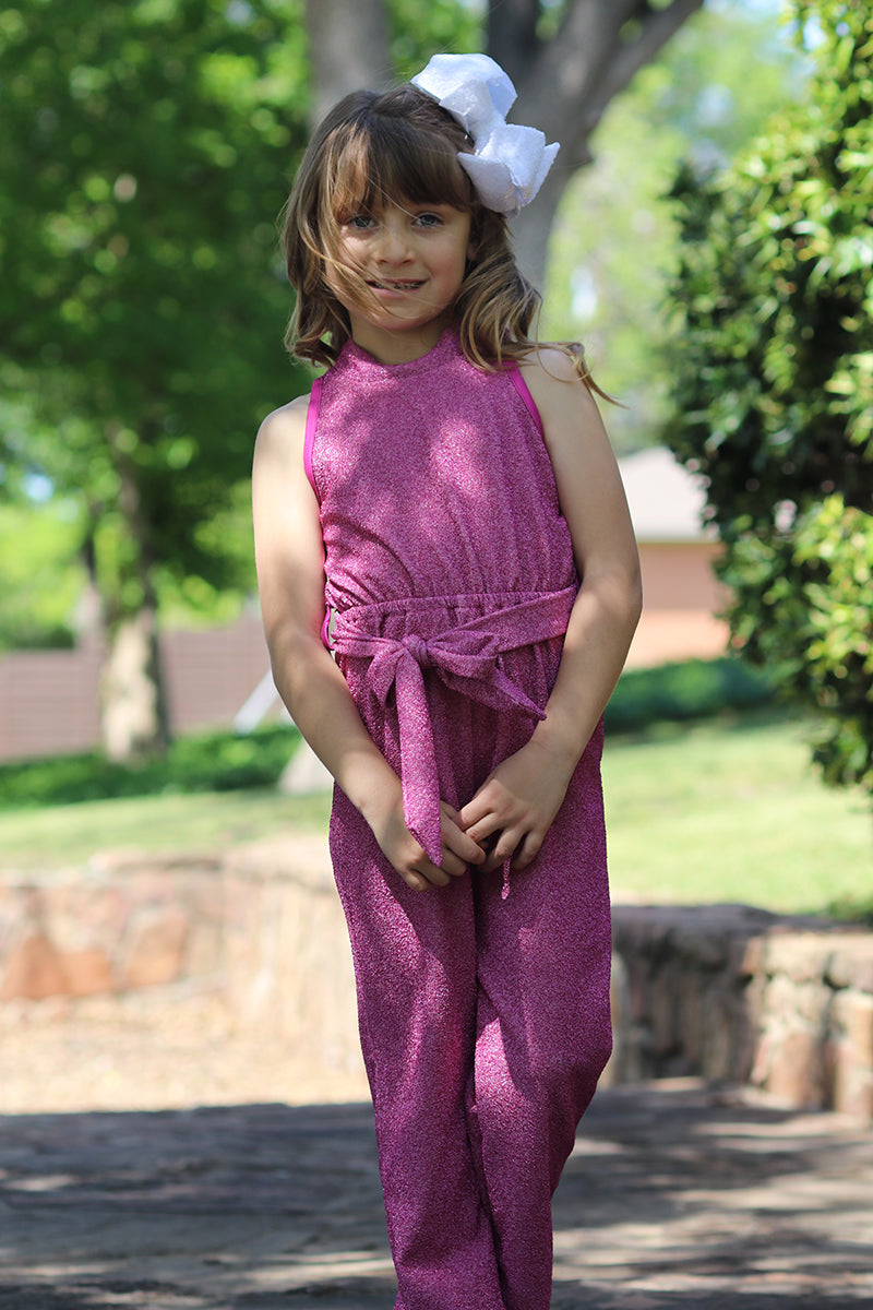 Shimmery jumpsuit perfect for occasion. -