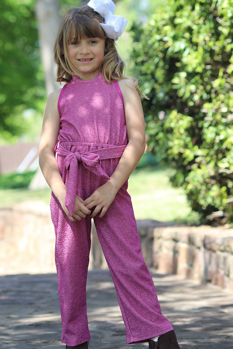 Shimmery jumpsuit perfect for occasion. -