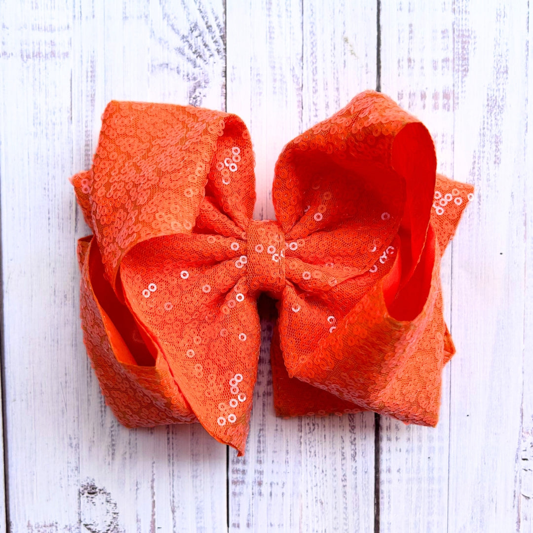 Double layer sequins bows w/alligator clip.
