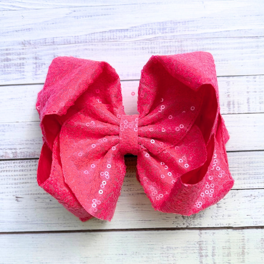 Double layer sequins bows w/alligator clip.