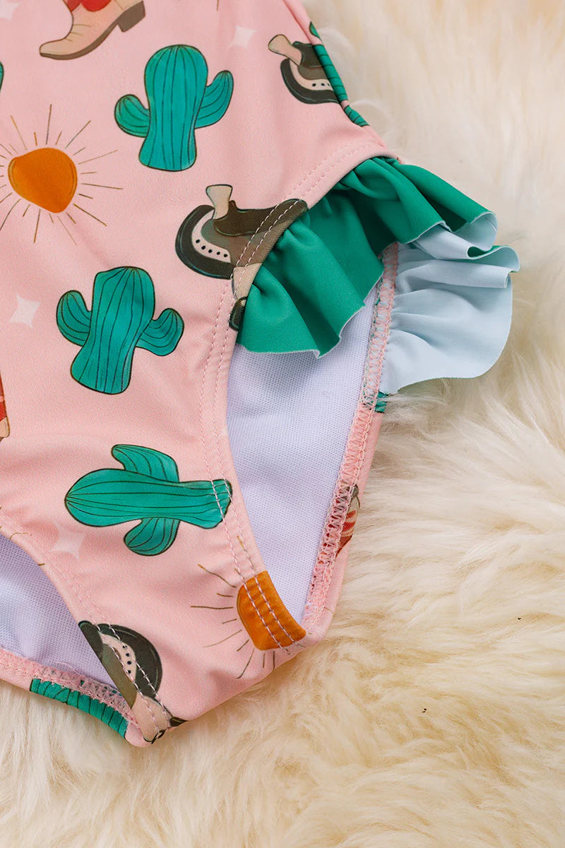 Western printed bathing suit with fold over ruffle.