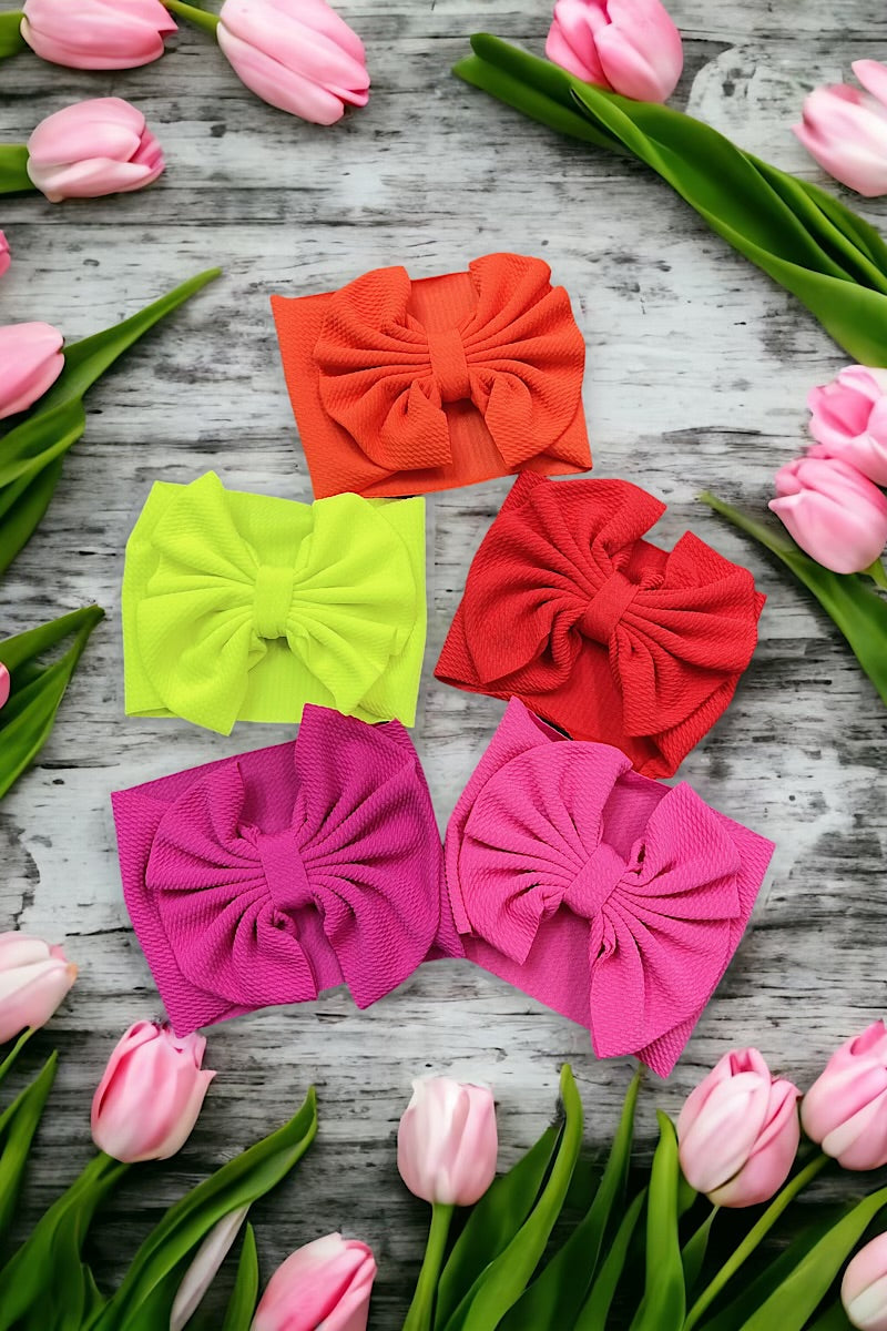 Wide band bow headband for baby.