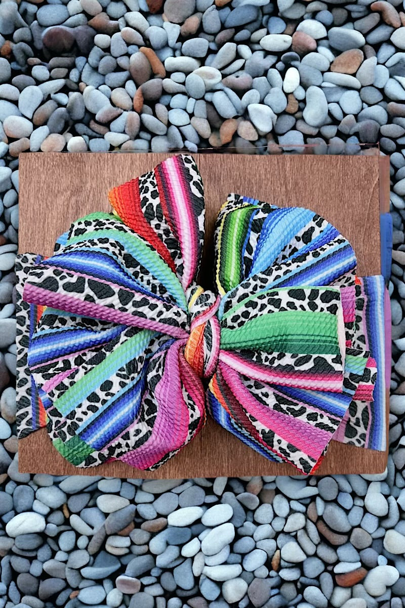 Serape printed big tassel baby headbands.