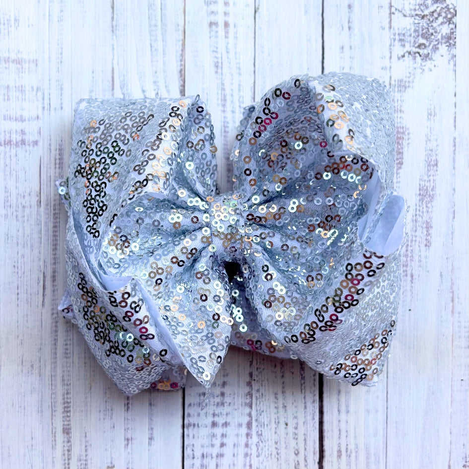 Double layer sequins bows w/alligator clip.