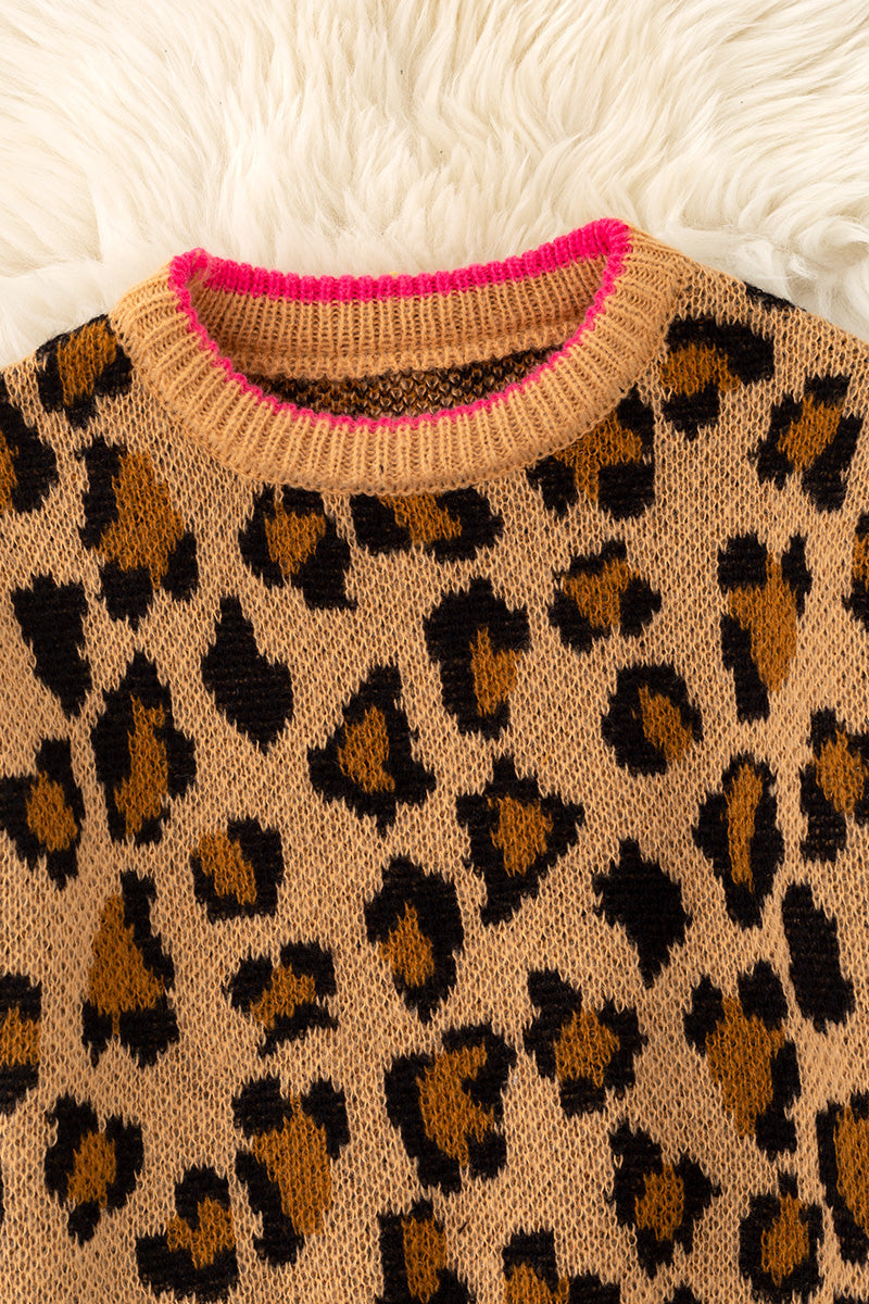 Leopard printed pullover sweater with fuchsia trim and lt. pink bows on sleeves. TPG60423