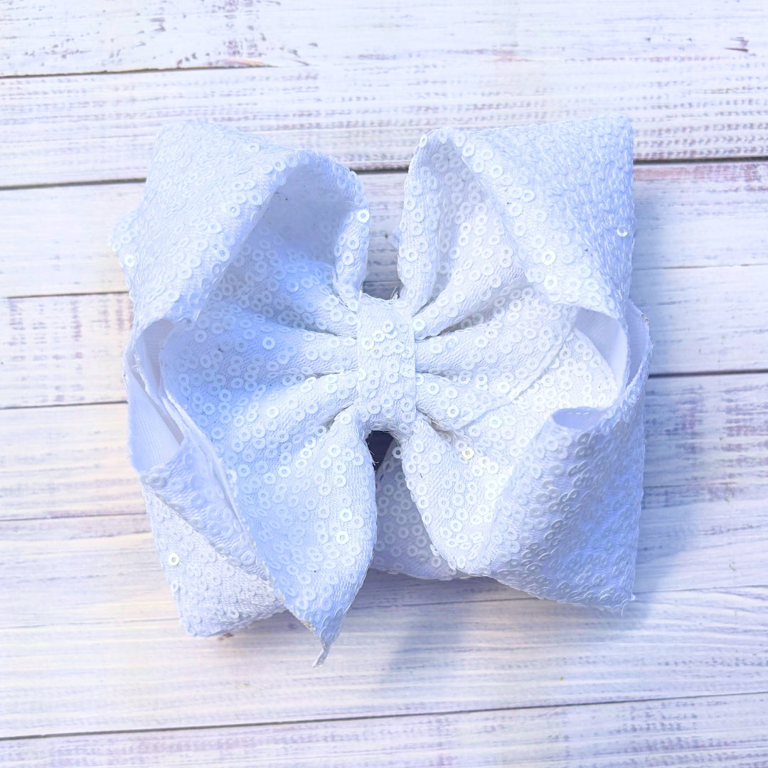 Double layer sequins bows w/alligator clip.
