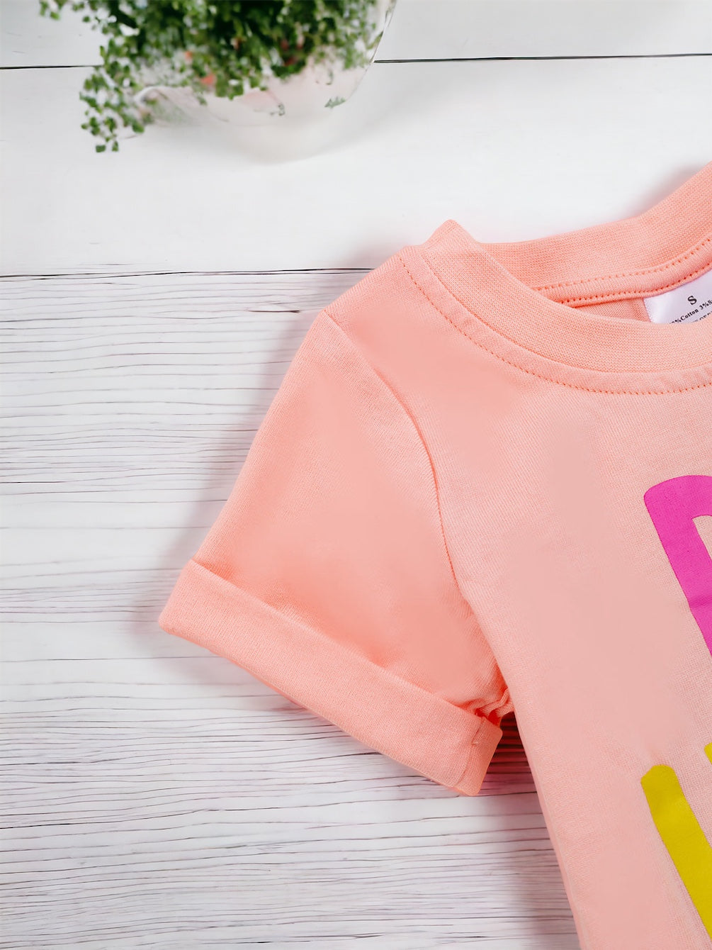 BE HAPPY PEACH T-SHIRT. TPG25154005