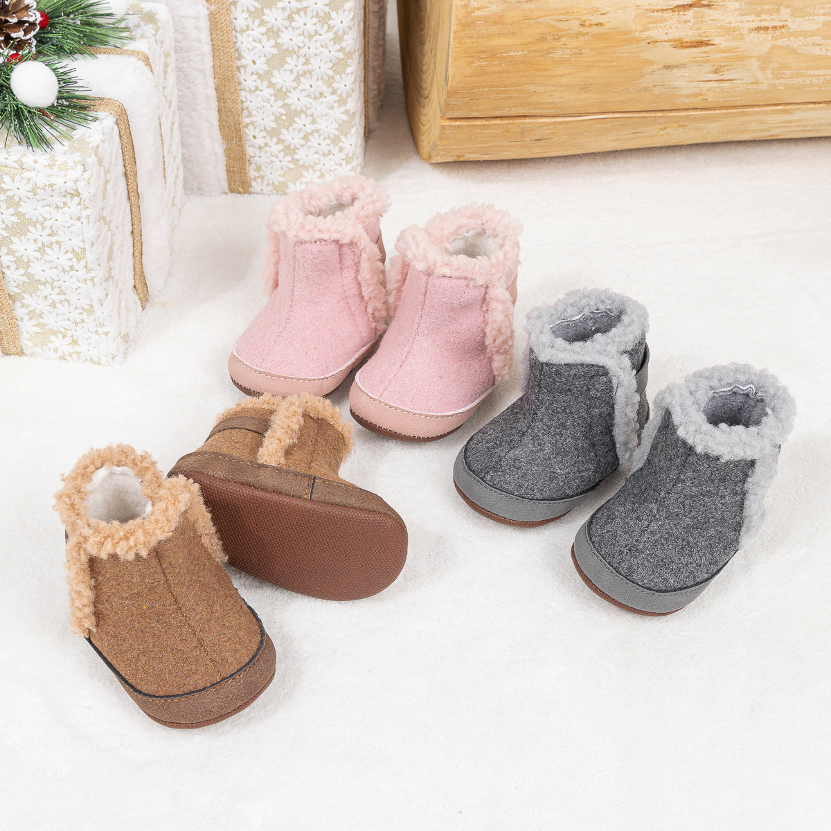 Brown faux fur baby boots. CG5402