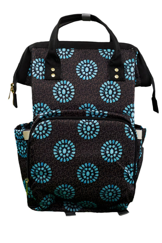 Western pattern diaper with compartments.