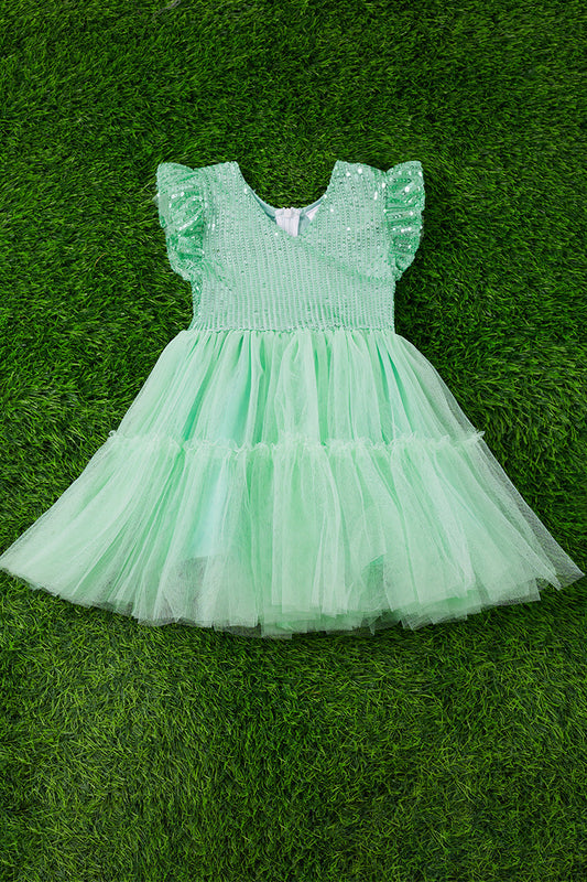 Mint tulle bottom dress with sequins &  angel sleeves.
